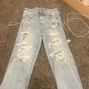 Light blue ripped skinny jeans